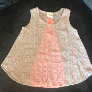 Sleeveless, sheer top